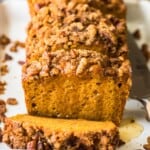 sliced loaf of oatmeal pumpkin bread on a plate