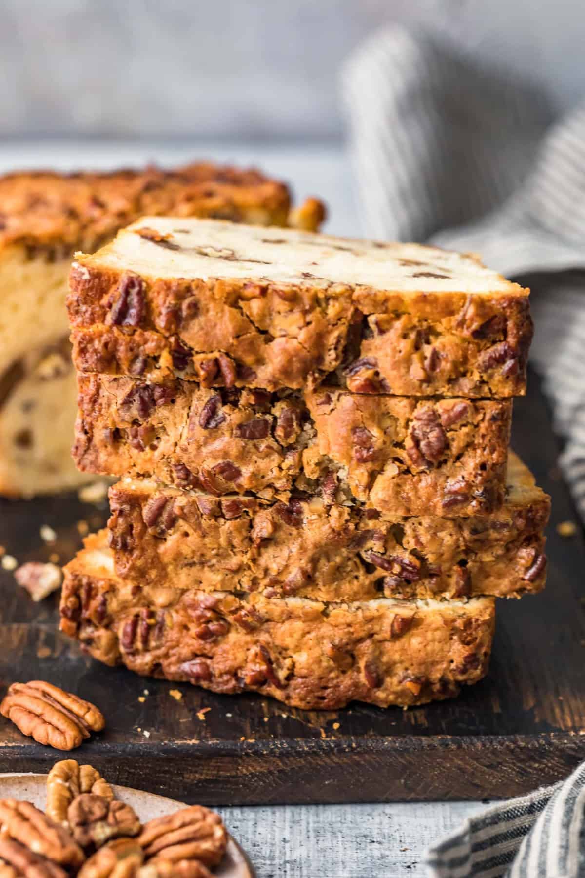 Slices of Pecan Pie Pound Cake stacked on top of each other