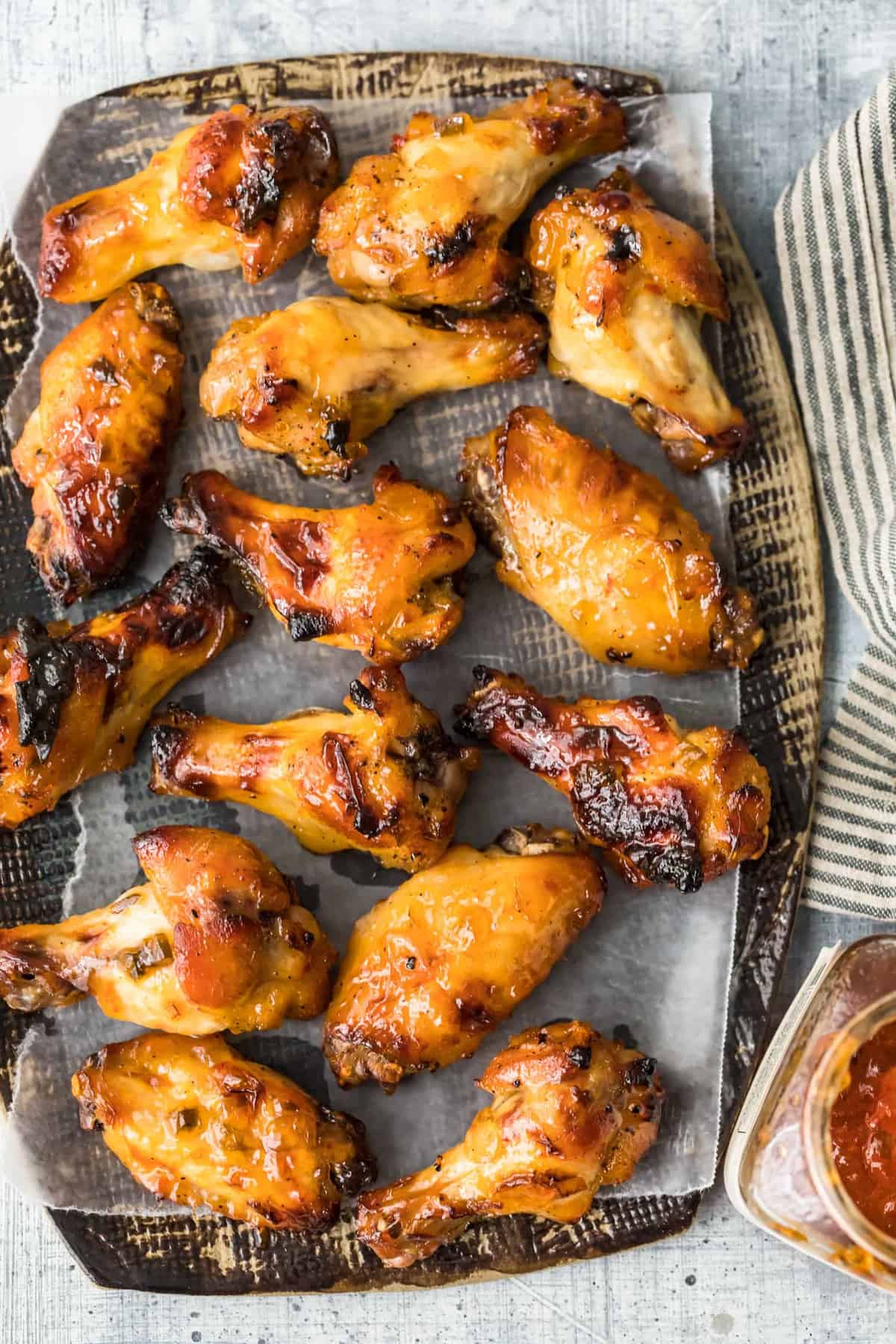 Pepper Jelly Chicken Wings spread out a a serving tray