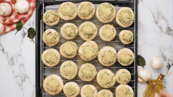 Spinach Stuffed Mushrooms on a cooling rack.