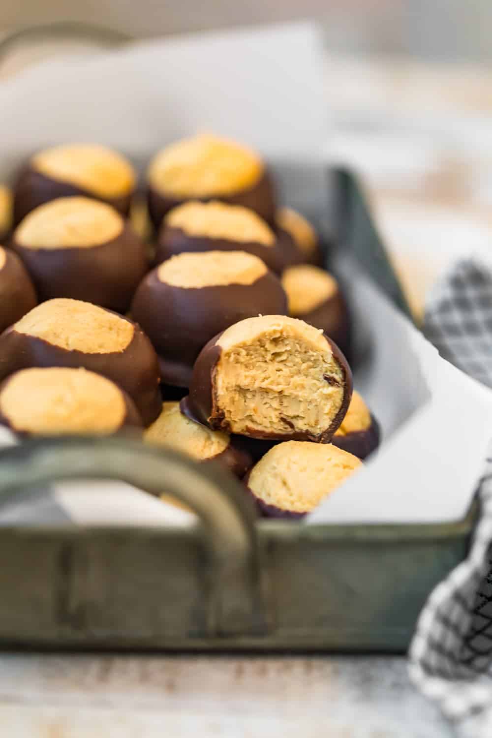 A Buckeye candy with a bite taken out of it