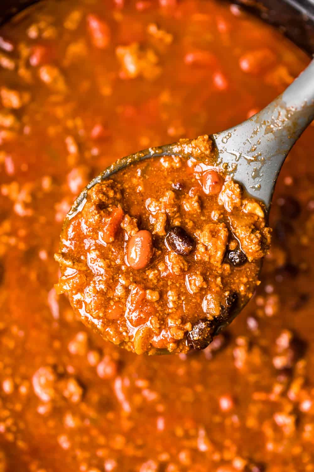 crockpot chili recipe on a spoon