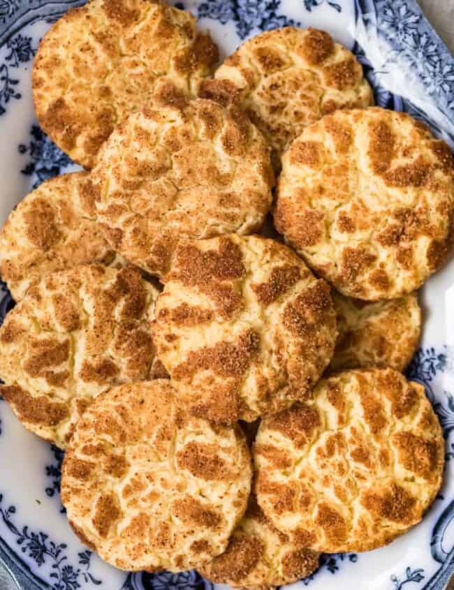 snickerdoodle cookies on a white and blue plate