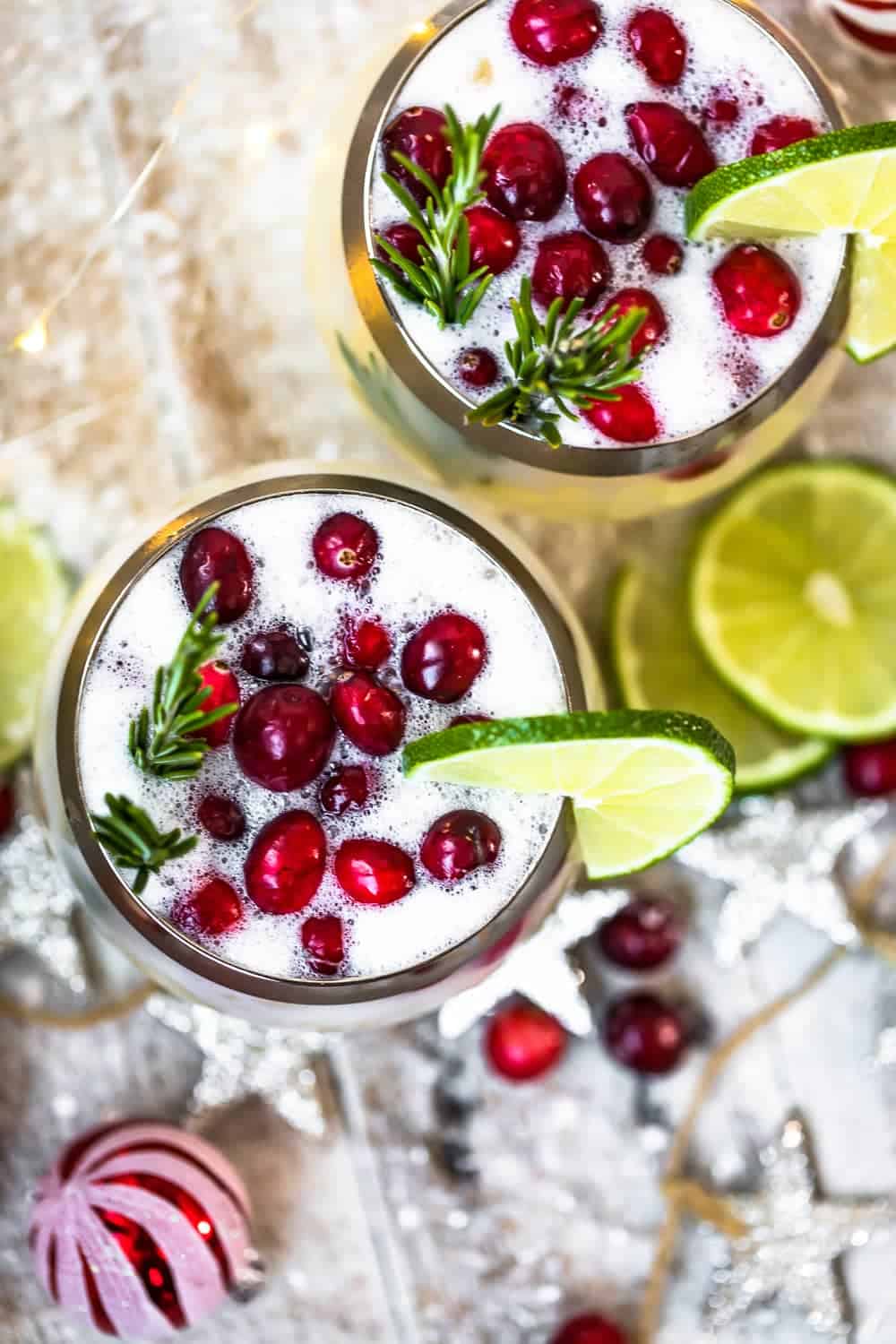 overhead image of white christmas tequila sours in glasses