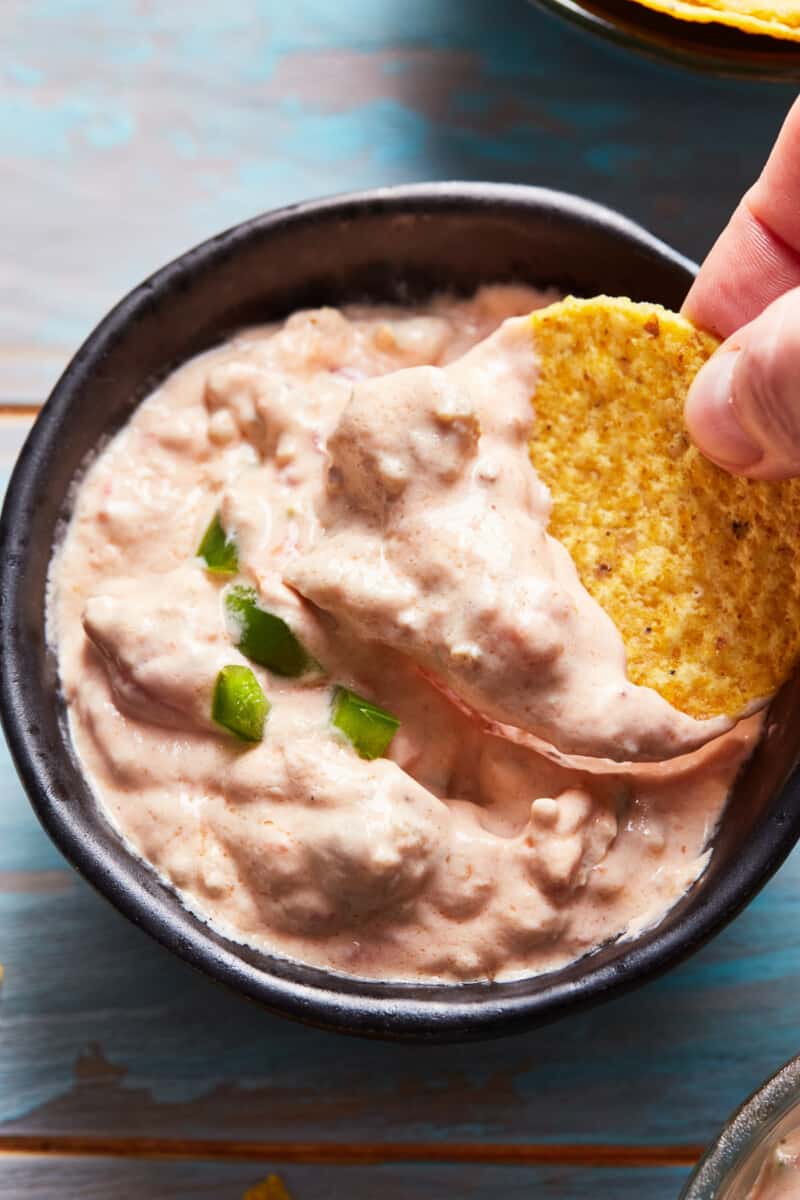 crockpot sausage cream cheese dip in black bowl