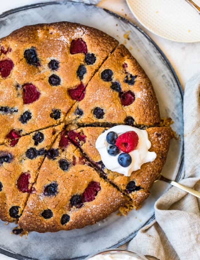 berry muffin coffee cake with whip cream on top