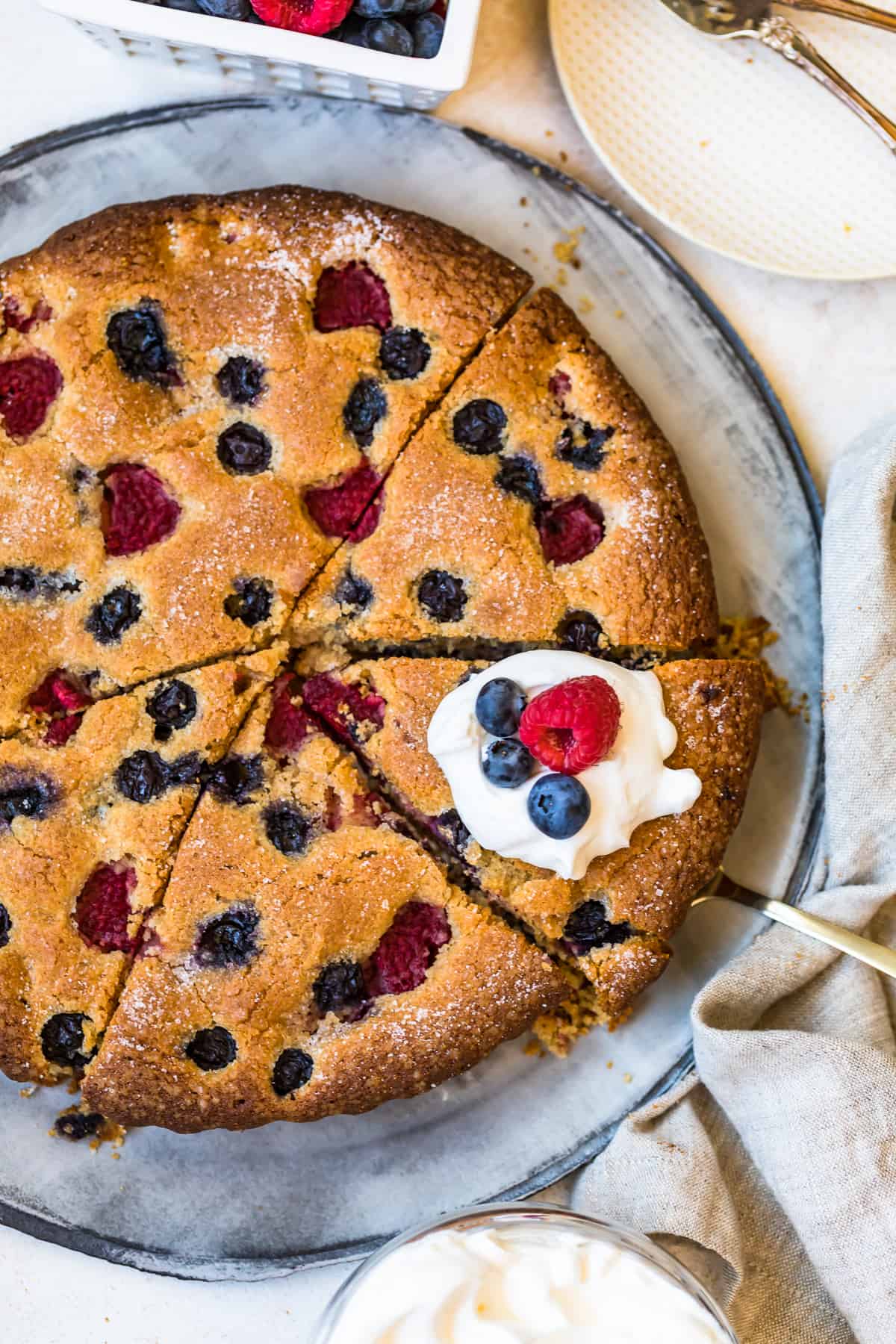 Blueberry Raspberry Coffee Cake cut into slices