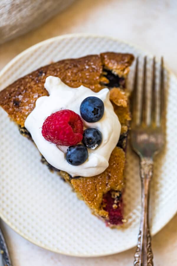 Over head shot of a slice of cake served with a fork