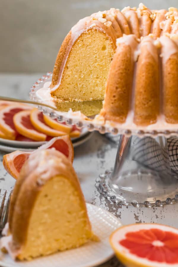 grapefruit cake with slice taken out