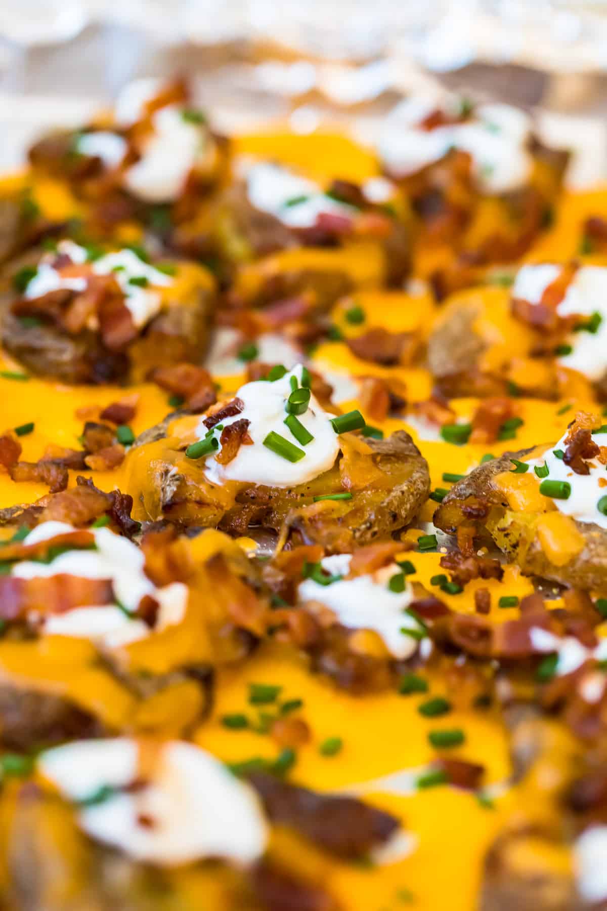 Loaded Smashed Potatoes sprinkled with chives