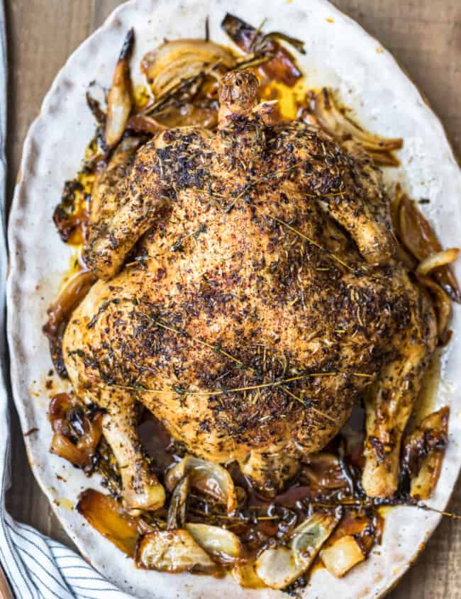 whole roasted chicken with herbs de provence on platter