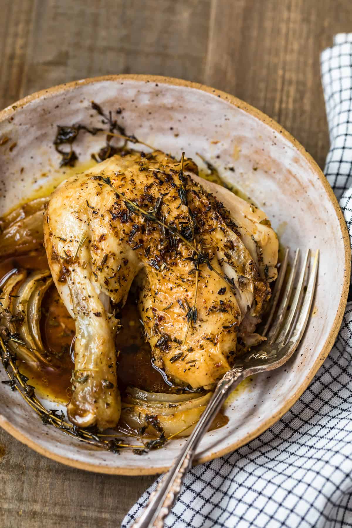 A chicken thigh in a bowl