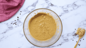 light brown batter in a glass bowl.