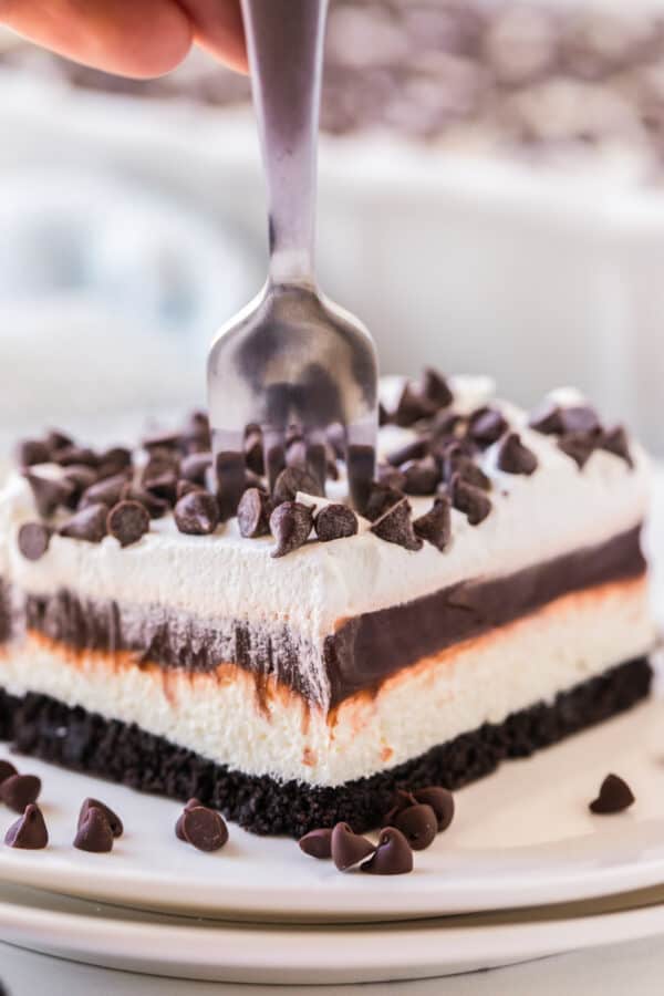 fork going down into chocolate lasagna