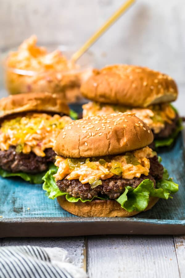 pimento cheeseburgers on blue platter