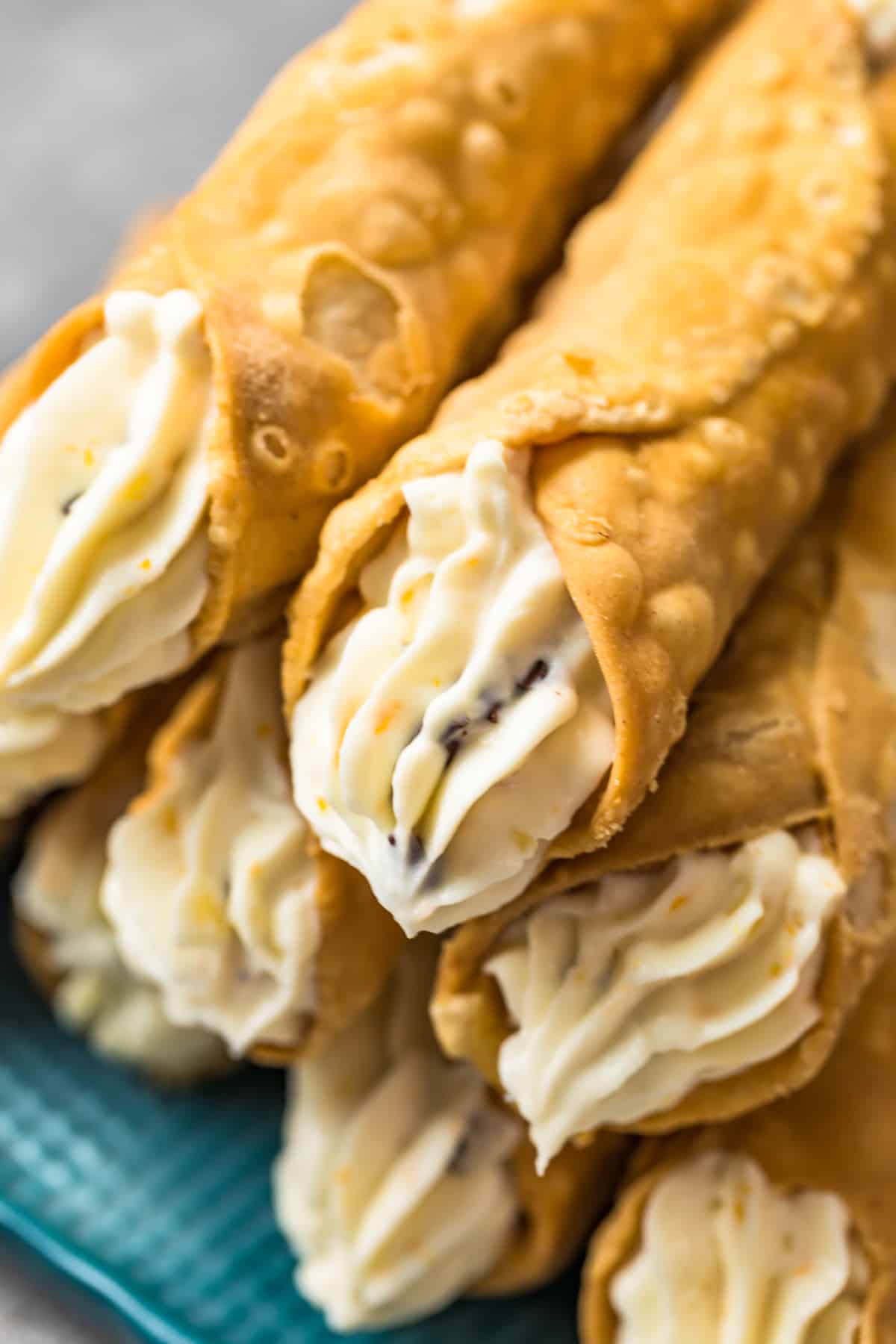 up close image of cannoli cream with orange, ginger, and chocolate chips