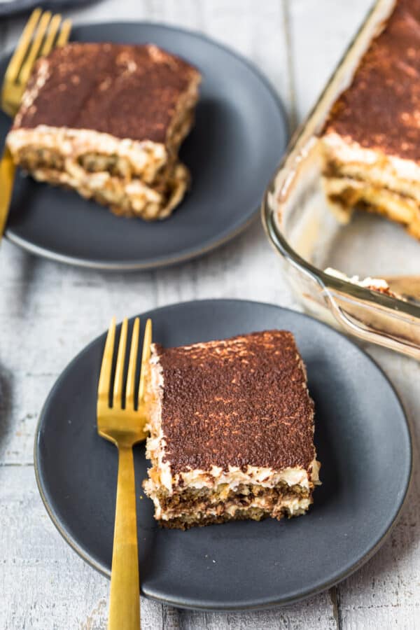 two slices of tiramisu on plates