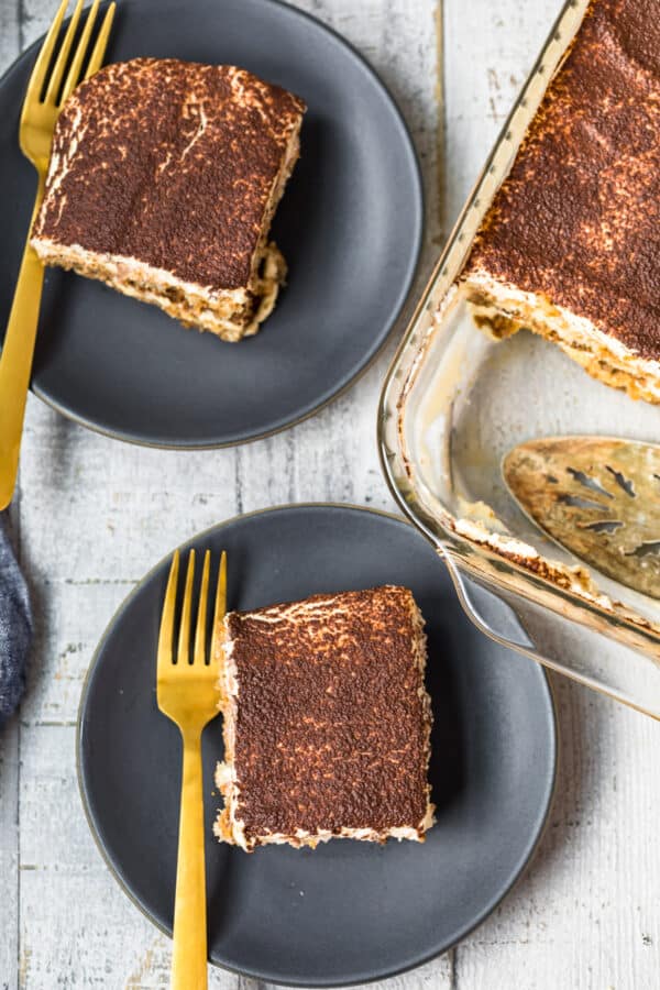 two slices of tiramisu on plates