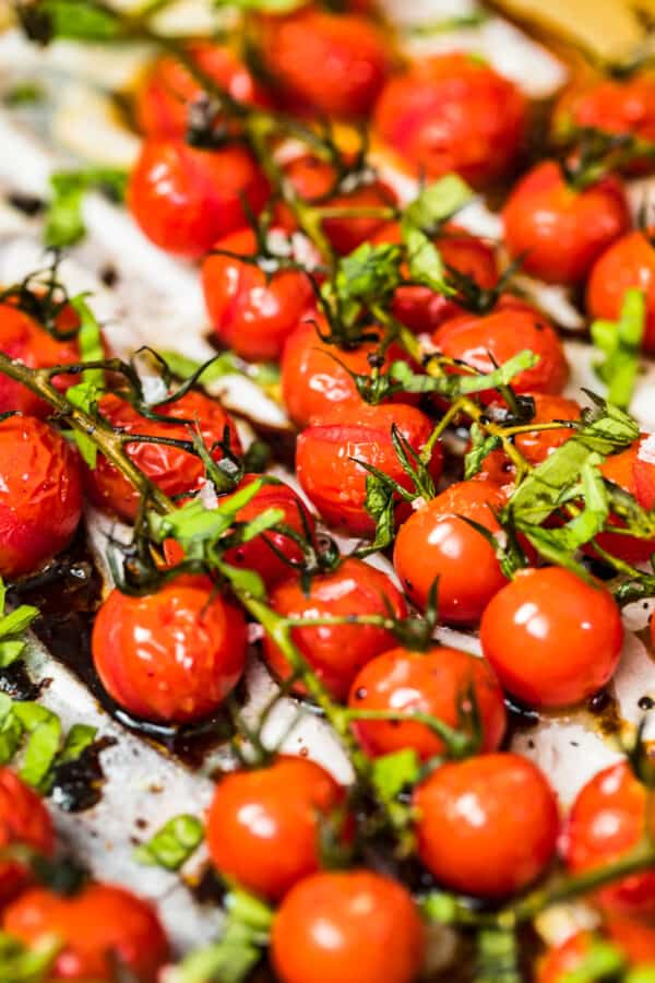 tomatoes with balsamic vinegar topped with basil