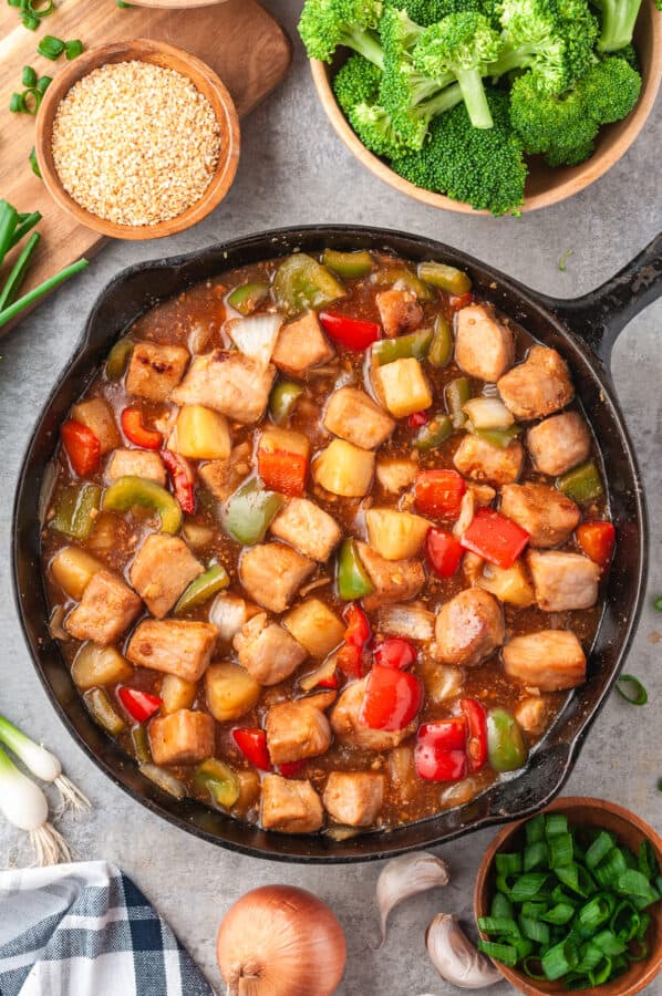 skillet filled with sweet and sour pork