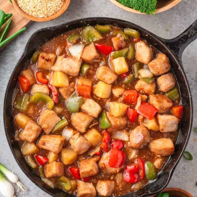 skillet filled with sweet and sour pork