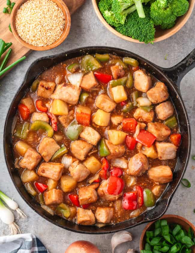 skillet filled with sweet and sour pork