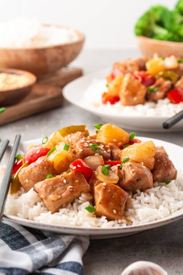 sweet & sour pork on plate over rice