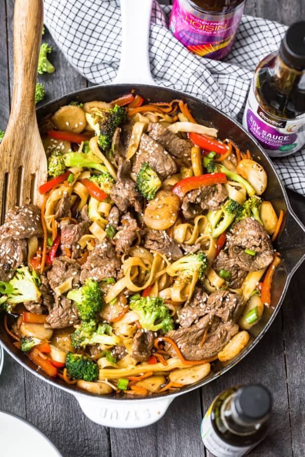 beef lo mein in white skillet