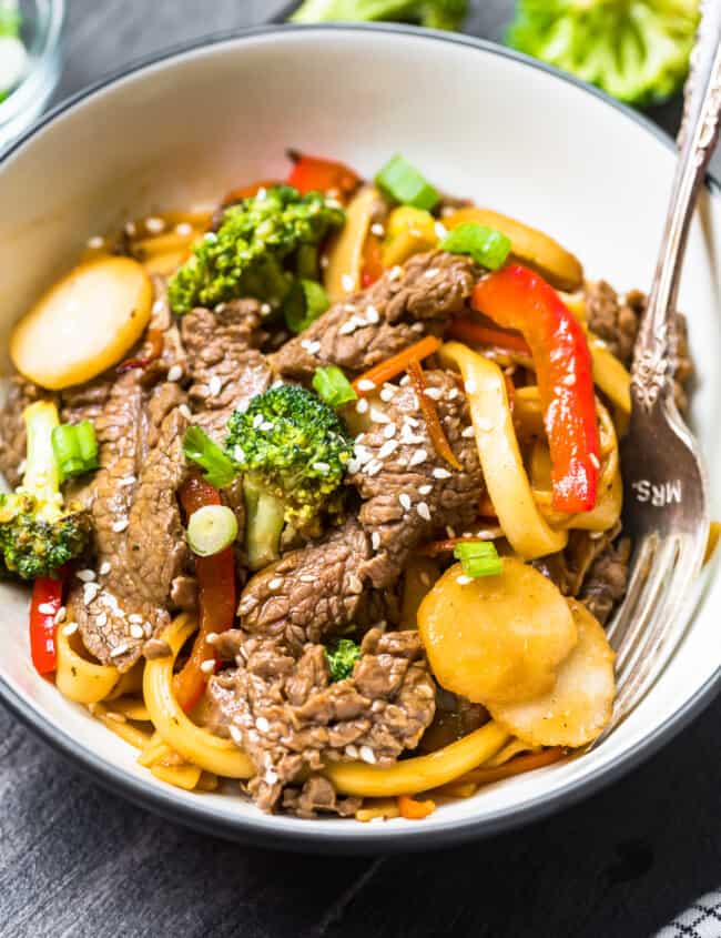 beef lo mein in white bowl