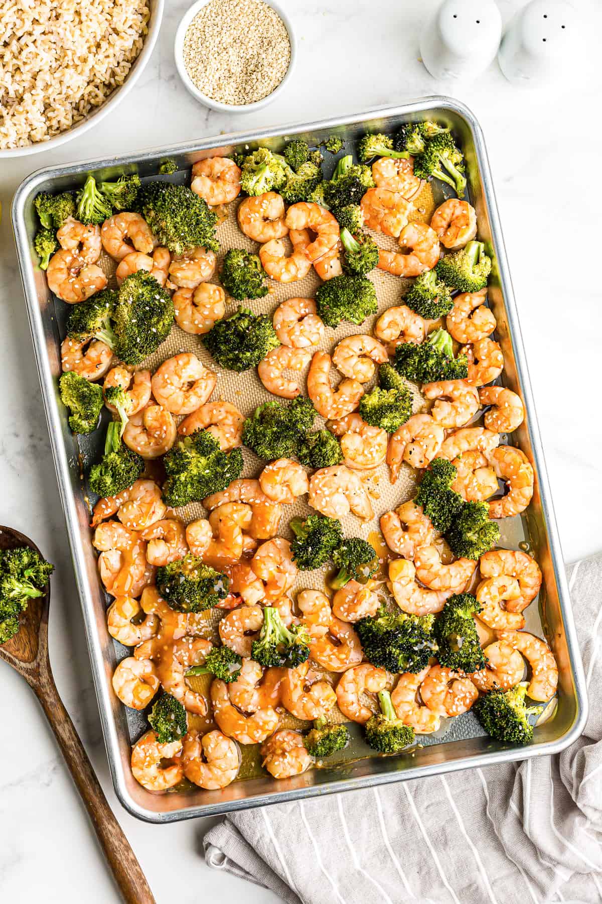 honey garlic shrimp and broccoli on sheet pan