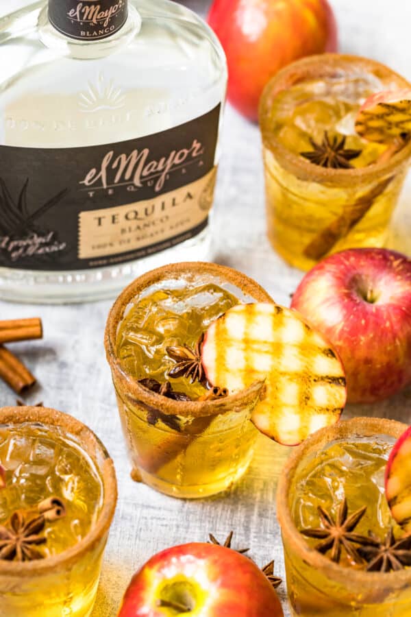 overhead picture of apple margaritas with grilled apple slices