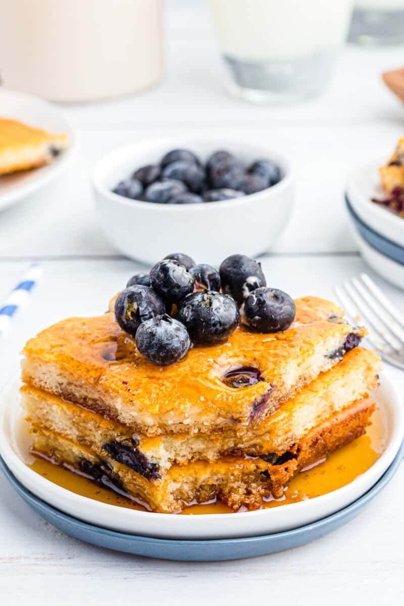 sheet pan blueberry pancakes topped with blueberries