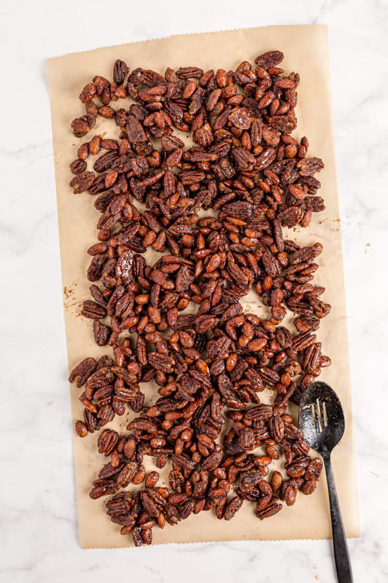 cooling crockpot candied nuts on parchment