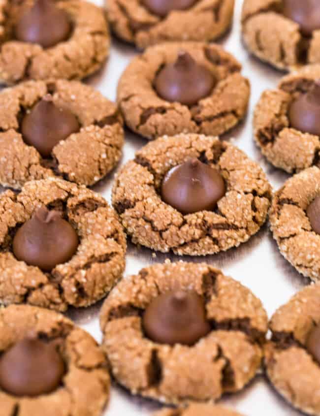 chocolate peanut butter blossoms on baking sheet