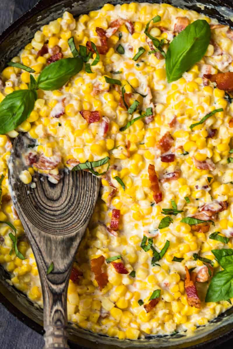 up close image of cast iron skillet creamed corn