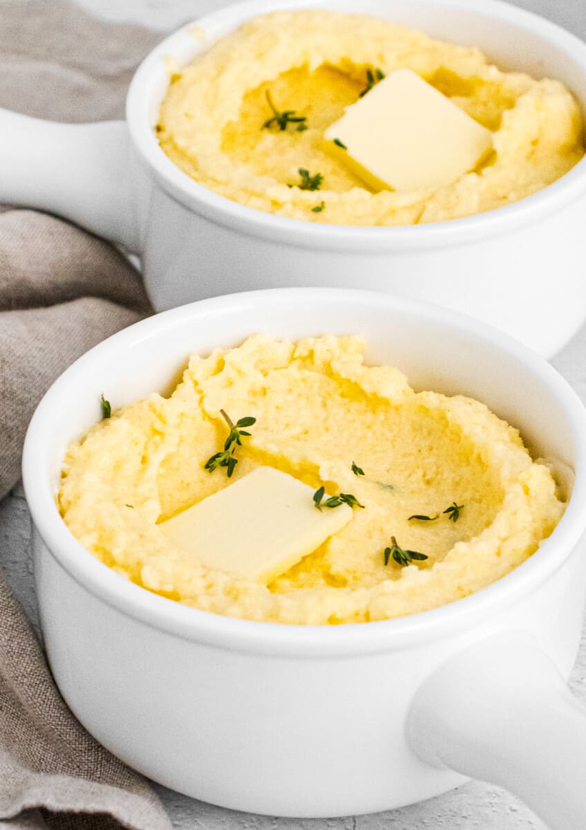 two bowls of creamy parmesan polenta