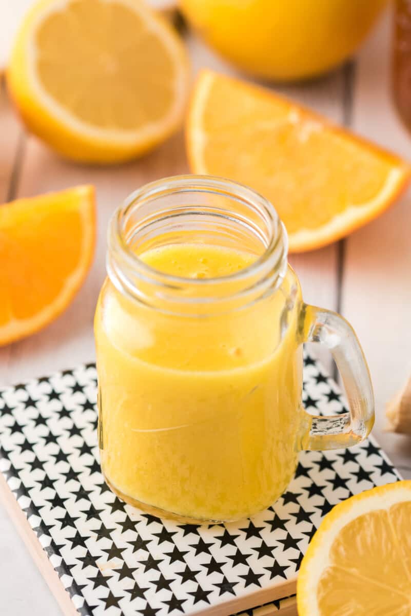 orange ginger shot on table