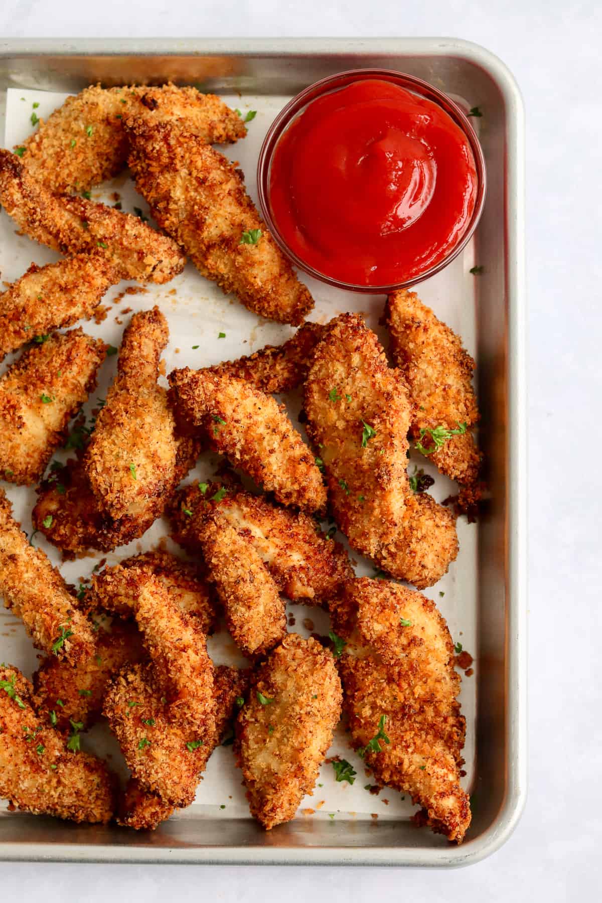 air fryer chicken tenders on baking sheet