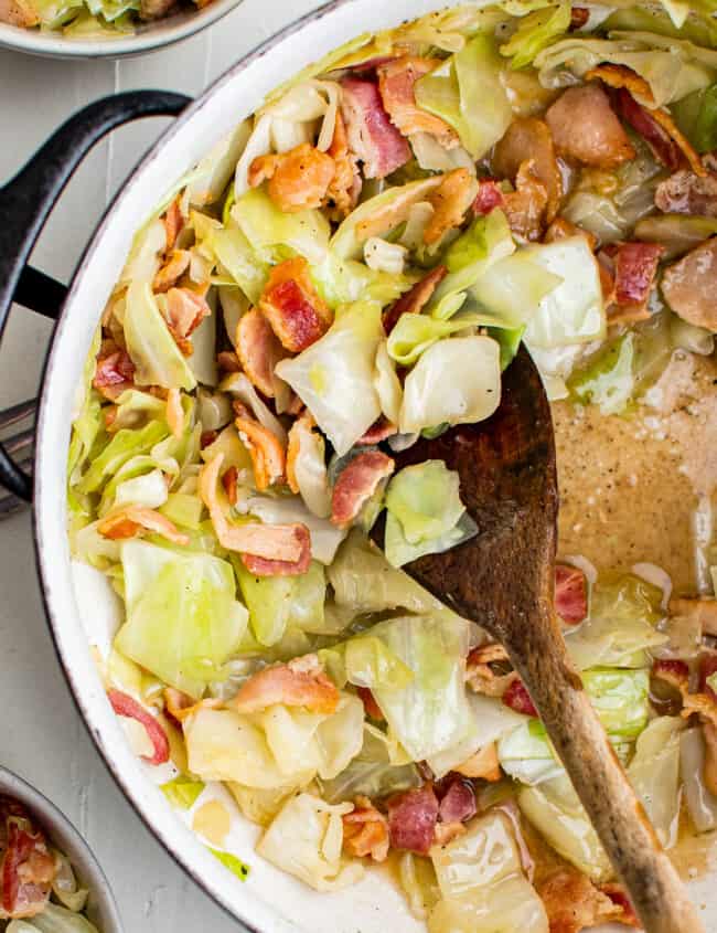 wooden spoon in cabbage and bacon