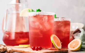 cranberry margaritas in glasses with salt rims