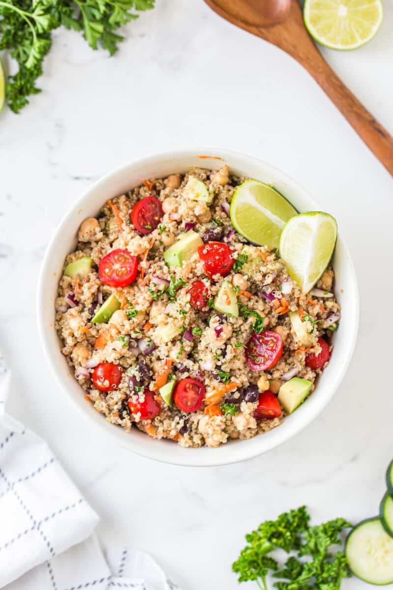 healthy quinoa salad in white bowl