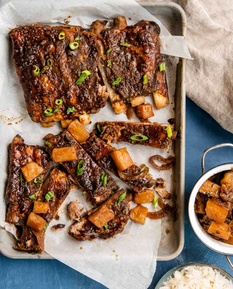 crockpot hawaiian ribs on sheet pan with pineapple