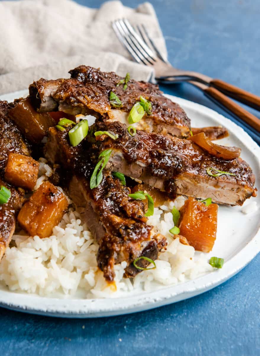 side shot plate of crockpot hawaiian ribs over rice