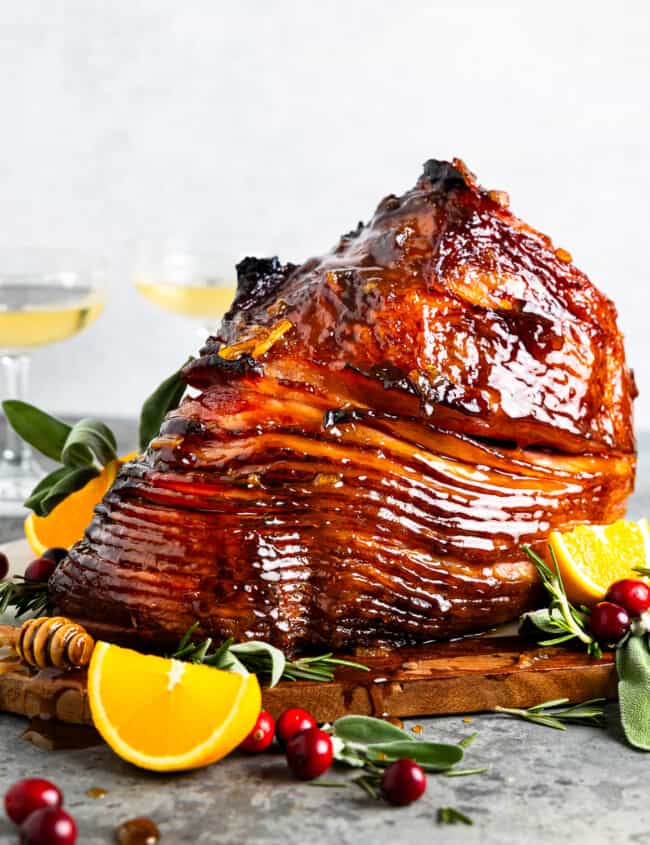 orange glazed ham on platter