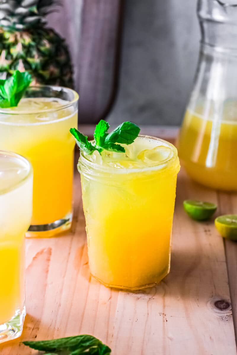 three glasses of pineapple agua fresca