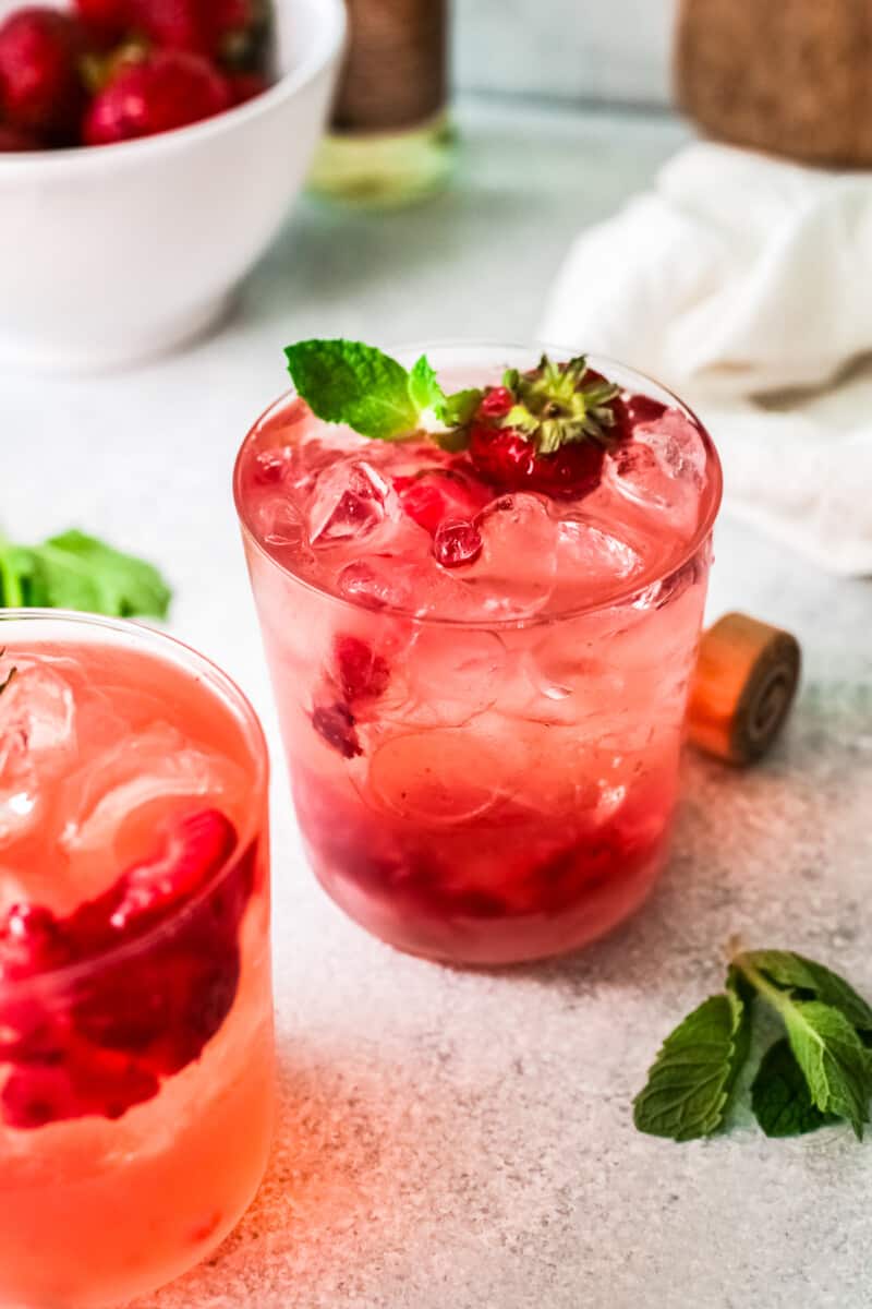 strawberry palomas garnished with strawberry slices