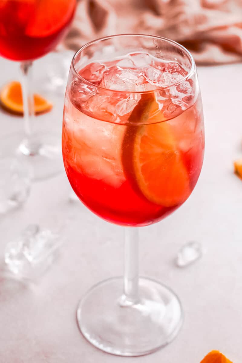 up close aperol spritz with orange slice