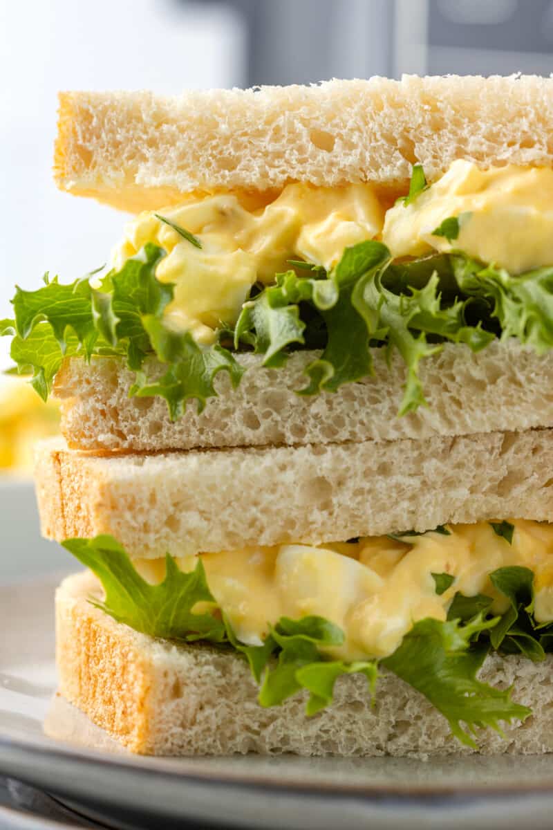 up close air fryer egg salad sandwiches stacked