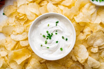 white bowl filled with white dip for chips