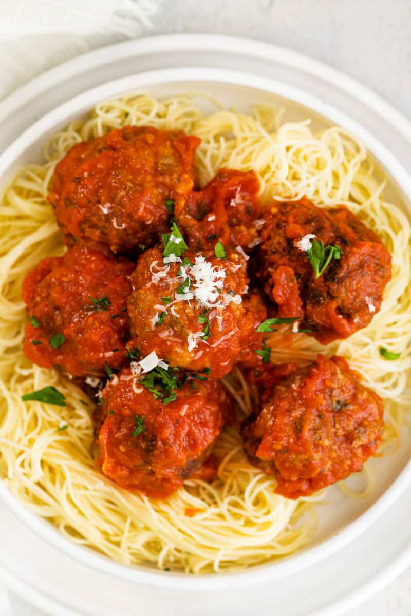 up close air fryer meatballs over pasta